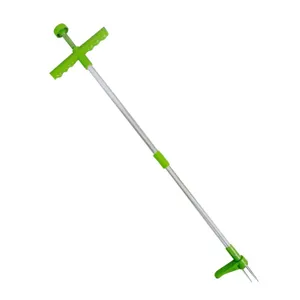 Detail view of manual weed remover tool with long aluminum handle and sharp prongs for easy garden.