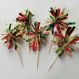 Detailed view of colorful metallic firework cake toppers, festive dessert decoration picks.