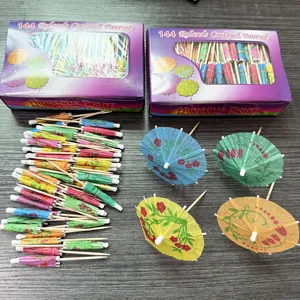 Detail shot of colourful cocktail umbrella picks in boxed set and loose display for party food.