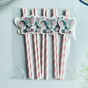 Pink white striped paper straws with cute elephant cards for party decoration and drinks.