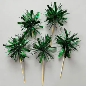 Green metallic tinsel cake topper picks detail shot, perfect for party desserts and celebration decoration.