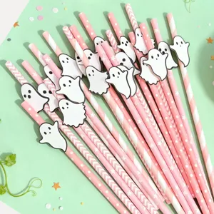 Close-up detail of cute Halloween paper drinking straws with white ghost decorations for party.