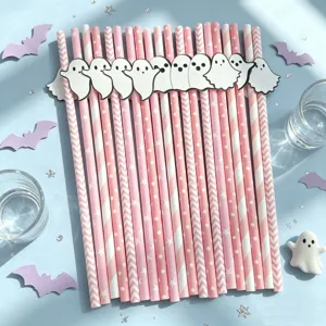 Detailed view of Halloween paper straws with cute ghost decorations for party table setup.