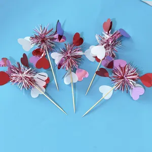 Valentine's Day decorative heart picks with sparkling tinsel fireworks and wooden sticks for cakes.
