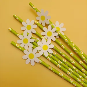 Green paper drinking straws with cute daisy cutouts for party decorations and events.