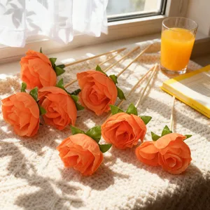 Stijlvolle oranje roos fruitprikkers voor cocktail en heerlijke dessert schaal.