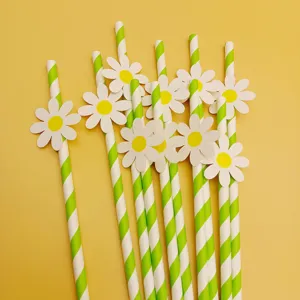 Green and white striped paper straws with cute daisy flower card decorations for party.