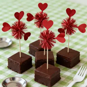 Red heart fireworks cake topper decoration picks for Valentine's Day party dessert display.