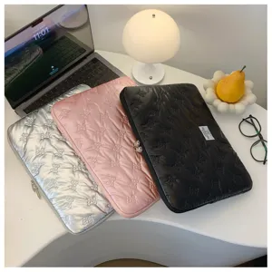 Detail view of Korean style quilted bow laptop sleeve, lightweight storage case 13 14 inch.