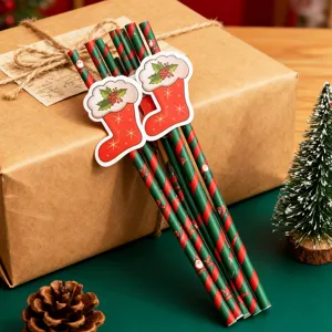 Christmas paper straws set with cute festive stocking cutout design for holiday party decor.