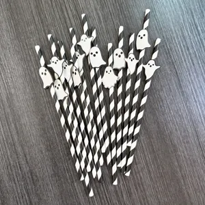 Halloween black white striped paper straws with cute ghost decorations for party drinks.