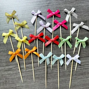 Colorful fabric bow cake toppers, decorative picks for birthday party and sweet dessert baking.