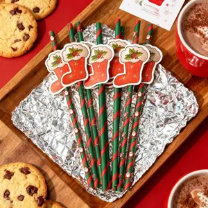 Christmas decorative paper straws with cute red stocking cutouts for holiday party supplies.