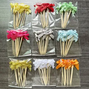 Ribbon bow wooden food picks set for cake dessert baking and party decoration details.