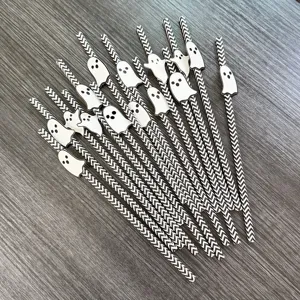 Halloween paper straws with cute ghost decorations, black and white chevron pattern for parties.
