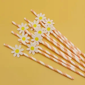 Colorful striped paper straws with cute daisy decorations, perfect for party and cake decor.