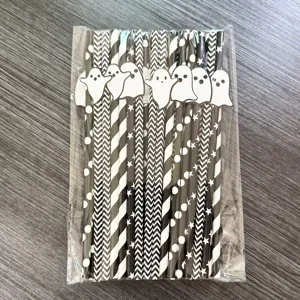 Halloween black and white paper straws with cute ghost decorations for party dessert table decor.