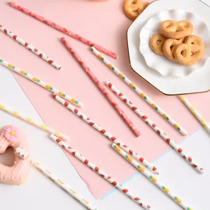 Eco-friendly paper straws with cute fruit patterns, colorful disposable straws for party decor.