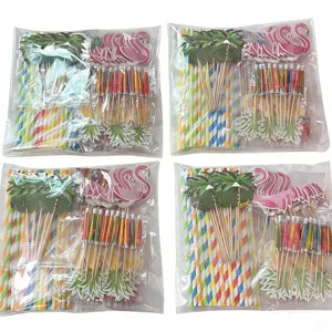 Hawaiian party decoration set with flamingo toppers, palm trees, paper umbrellas and colorful straws.