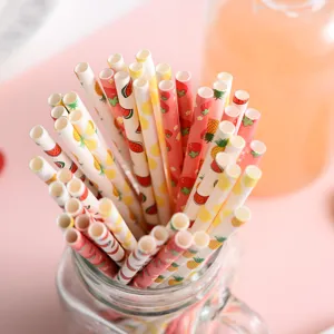 Biodegradable paper straws with fruit patterns, perfect for party decoration and drinks display.