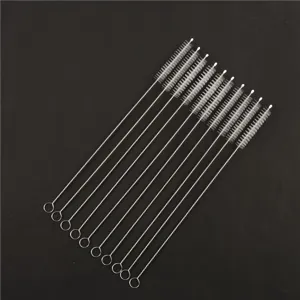 Stainless steel straw cleaning brush detail view, thin wire pipe cleaner with white bristles.