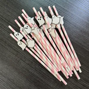 Halloween paper straws with cute ghost decorations, pink and white striped party drinkware.