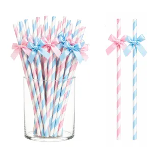 Cannucce di carta rigate con fiocchi in raso rosa e blu, ideali per feste e compleanni.