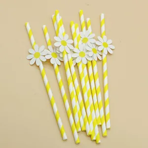 Details of decorative paper drinking straws with cute daisy cards and yellow stripes for parties.