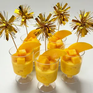 Gold tinsel fireworks picks detail shot showcasing dessert decoration toppers for parties.