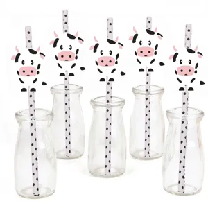 Cute cow paper straws with clear glass bottles set for party decoration and kids birthday.