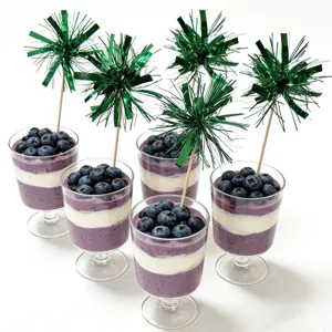 Green tinsel cake topper decorative picks fireworks design for party dessert cup display detail.