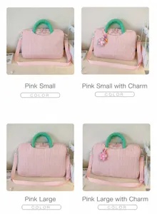Pink textured laptop tote bag with green handles and optional pendant, stylish large capacity bag.