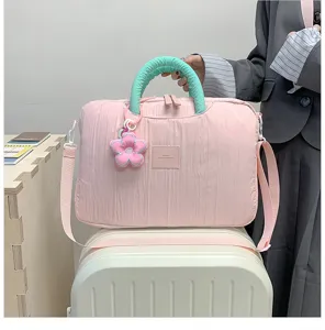 Pink pleated laptop bag tote bag with mint green handle and cute flower pendant for women.