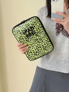 Transparent leopard print 11 inch iPad sleeve Korean style trendy laptop bag for daily use.