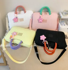 Stylish textured laptop tote bag with cute flower pendant, large capacity summer commuter bag.