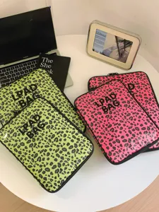 Transparent leopard print laptop sleeve and iPad bag, stylish 11-inch and 14-inch case.