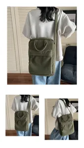 Detailed shot of the casual green corduroy backpack, showing fabric texture and wear style.