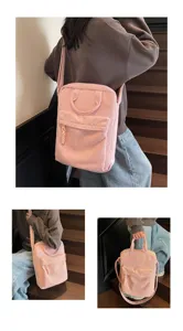 Pink corduroy laptop backpack for women, large capacity casual school bag and travel daypack.