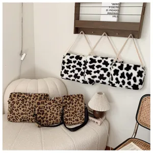 Custodia per laptop in peluche maculata e leopardata, borsa a tracolla morbida per tablet.