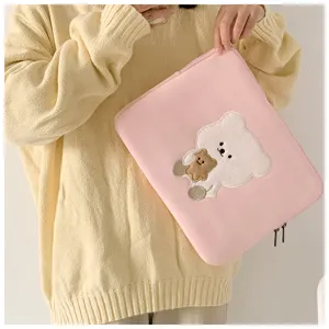 Pink laptop sleeve with cute bear embroidery, soft tablet storage bag for 11-13 inch devices.