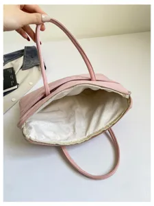 Quilted laptop tote bag 14 inch pink sleeve interior plush lining commuter business style.