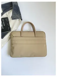 Minimalist beige laptop sleeve with dual handles and front pocket for business commuting.