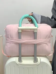 Pink puffer laptop tote bag large capacity travel shoulder bag with convenient luggage strap.