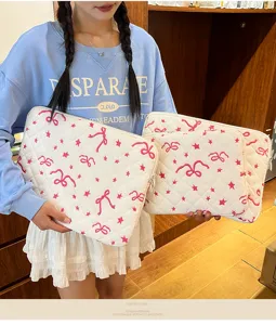 Korean ins style cute quilted laptop sleeve with pink bow and star embroidery for tablet storage.