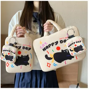 Detailed view of cute Korean style canvas laptop sleeve bag with lovely black cat print set.