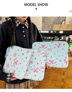 Cute bow embroidery laptop sleeve and tablet storage bag with sweet aesthetic design.