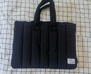 Black quilted laptop bag tablet sleeve with handles minimalist daily commute organizer