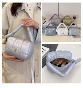 Quilted puffer cosmetic bag with large capacity, lightweight and portable travel toiletry storage.