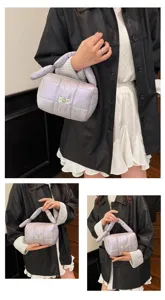 Stylish lightweight puffy quilted handbag, cute travel makeup bag and portable toiletry pouch.