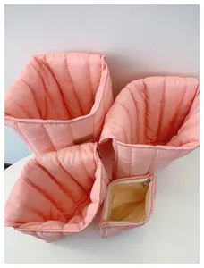 Pink quilted padded storage pouch set, soft cotton cosmetic bag and travel organizer.